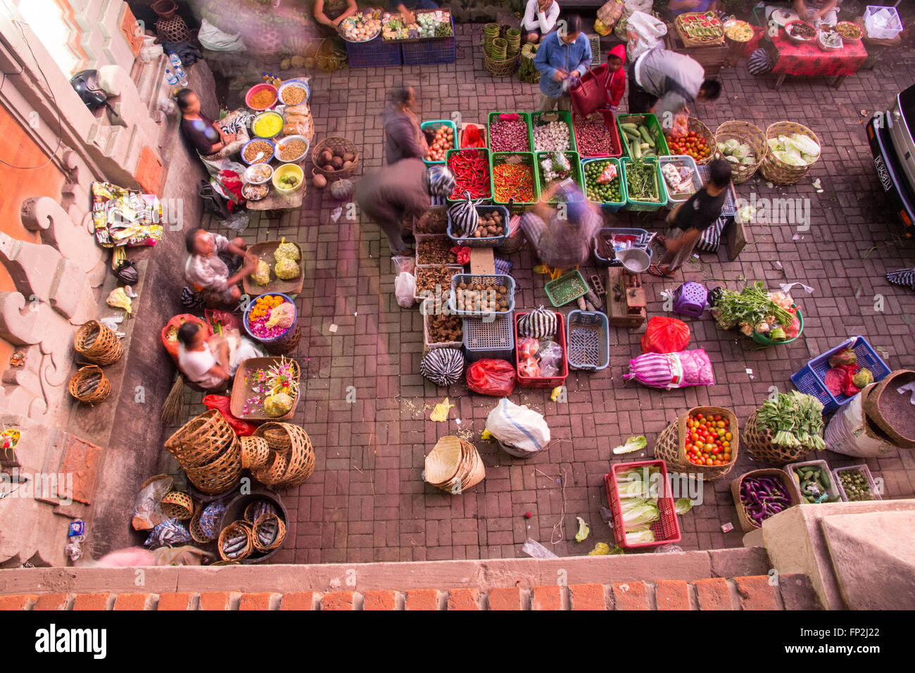 Asia, Indonesia, Bali. Ubud early morning market with flowers,fruit and