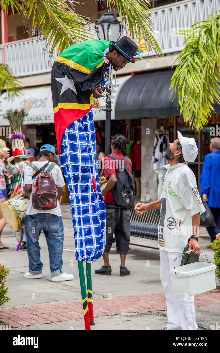 Man on Stilts, on St. Kitts Stock Photo Alamy