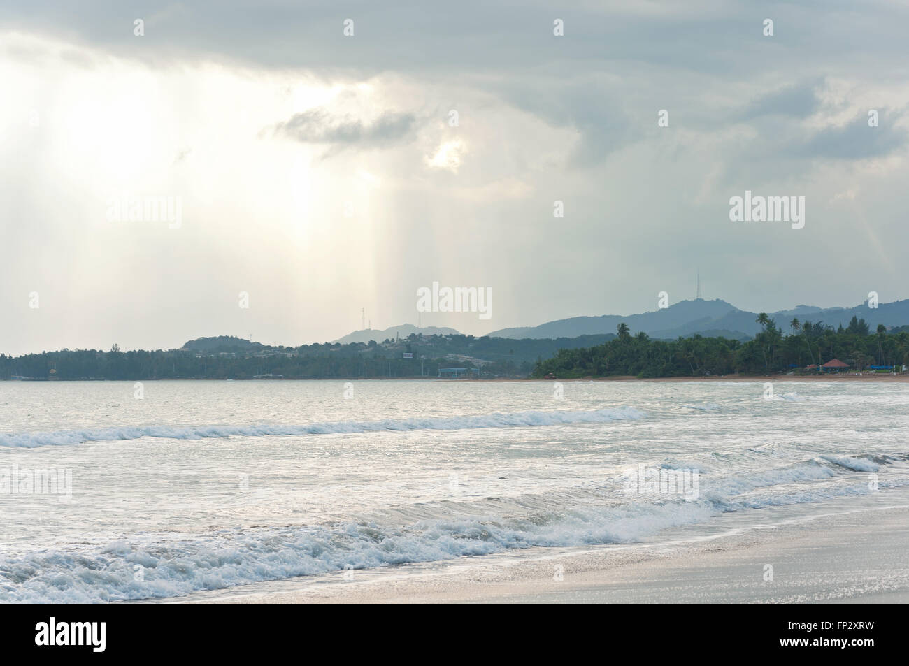 caribbean beaches tides and mountains on horizon in puerto rico Stock