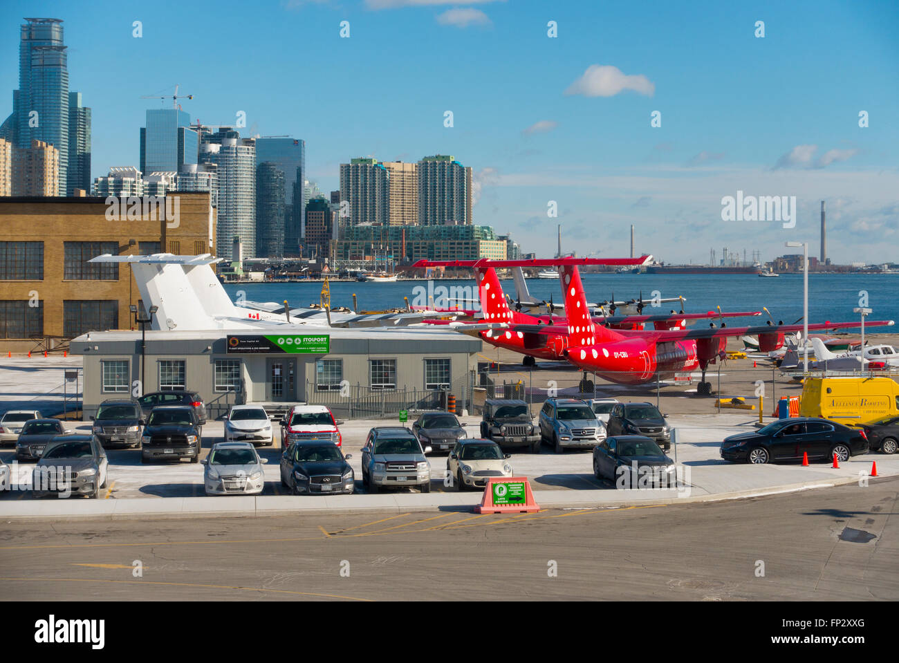 Planes at the Billy Bishop Toronto City Airport overlooking the parking lot. Toronto, Ontario, Canada. Stock Photo