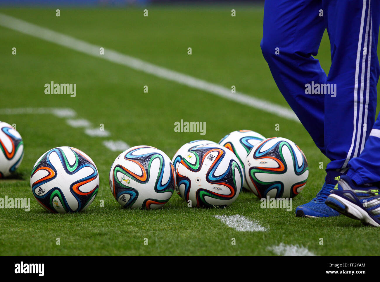 KYIV, UKRAINE - MAY 18, 2014: Official FIFA 2014 World Cup balls (Brazuca) on the grass during Ukraine Championship game between FC Dynamo Kyiv and FC Zorya Luhansk at Olympic stadium in Kyiv Stock Photo