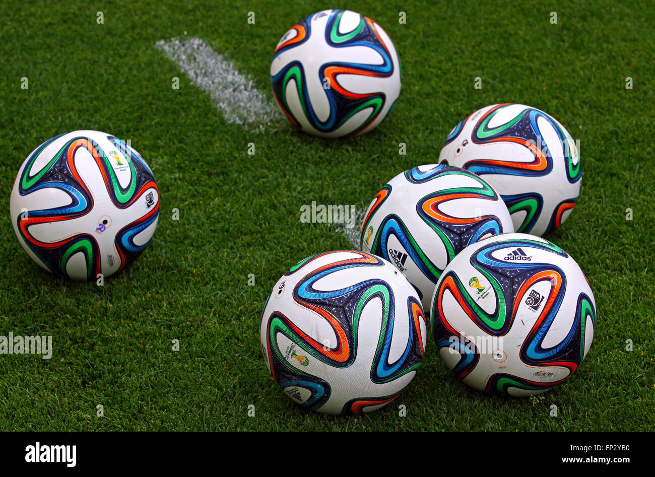 KYIV, UKRAINE - MAY 18, 2014: Official FIFA 2014 World Cup balls (Brazuca) on the grass during Ukraine Championship game between Stock Photo