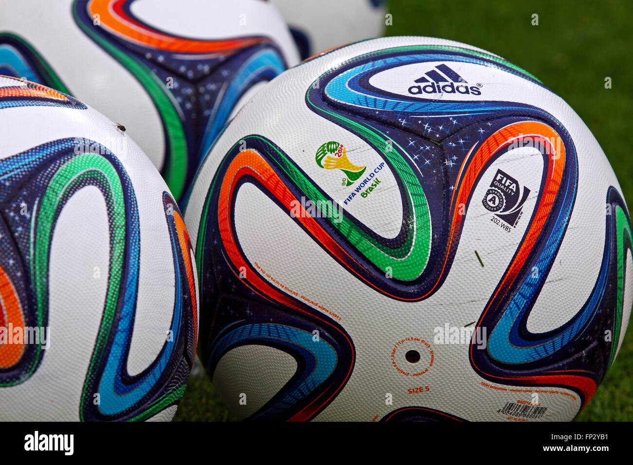 KYIV, UKRAINE - MAY 18, 2014: Close-up official FIFA 2014 World Cup balls (Brazuca) on the grass during Ukraine Championship game between FC Dynamo Kyiv and FC Zorya Luhansk at Olympic stadium in Kyiv Stock Photo