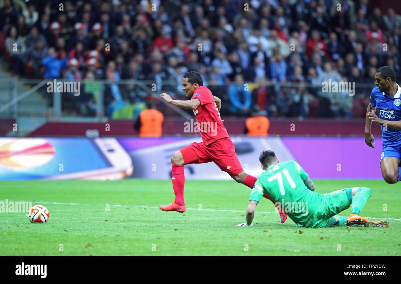 WARSAW, POLAND - MAY 27, 2015: Carlos Bacca (in Red) of FC Sevilla scores a goal during UEFA Europa League Final game against FC Dnipro at Warsaw National Stadium Stock Photo