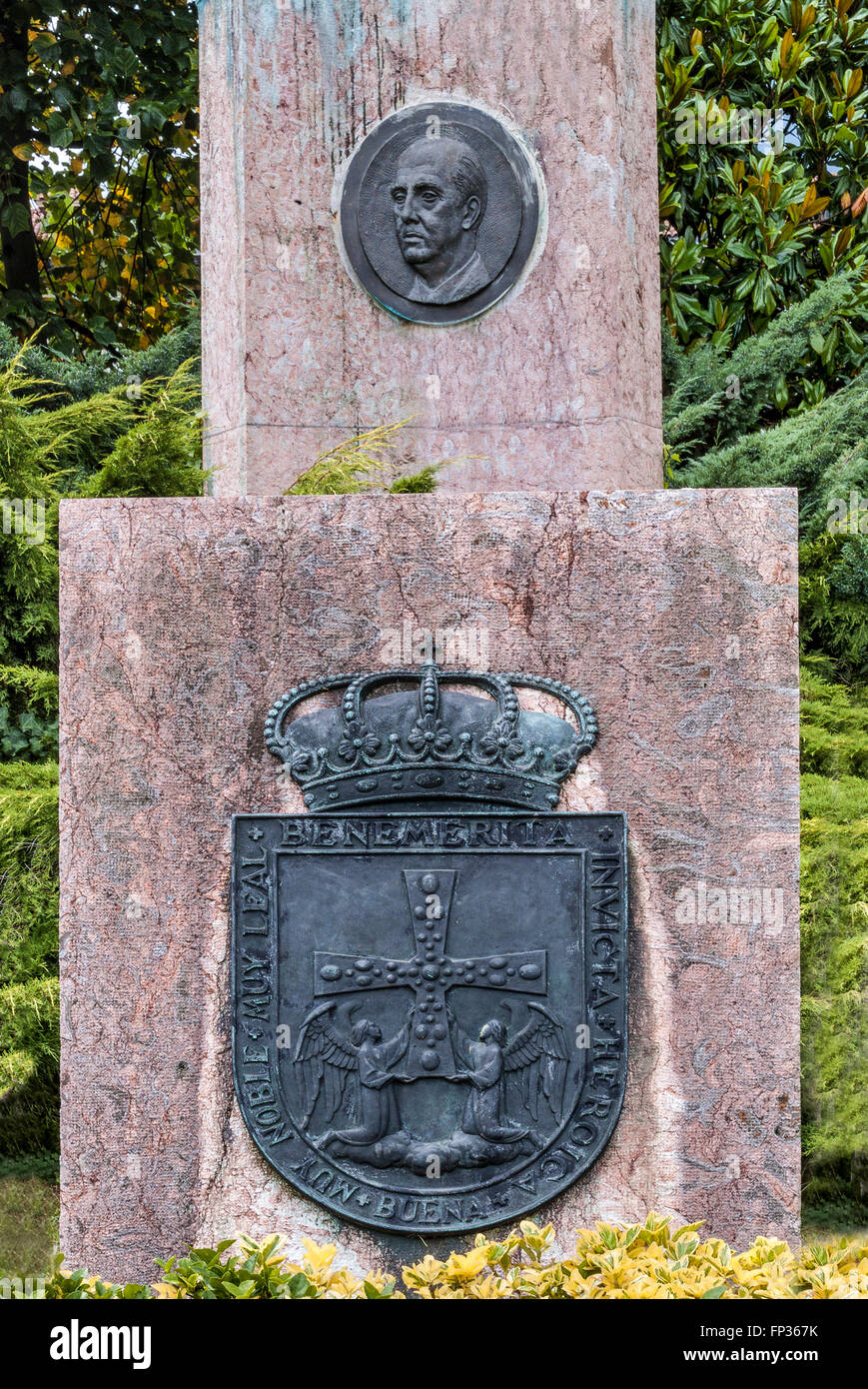 Monument to dictator Francisco Franco from 1975, detail, portrait of Franco was removed in 2015, in front the crest of the Stock Photo