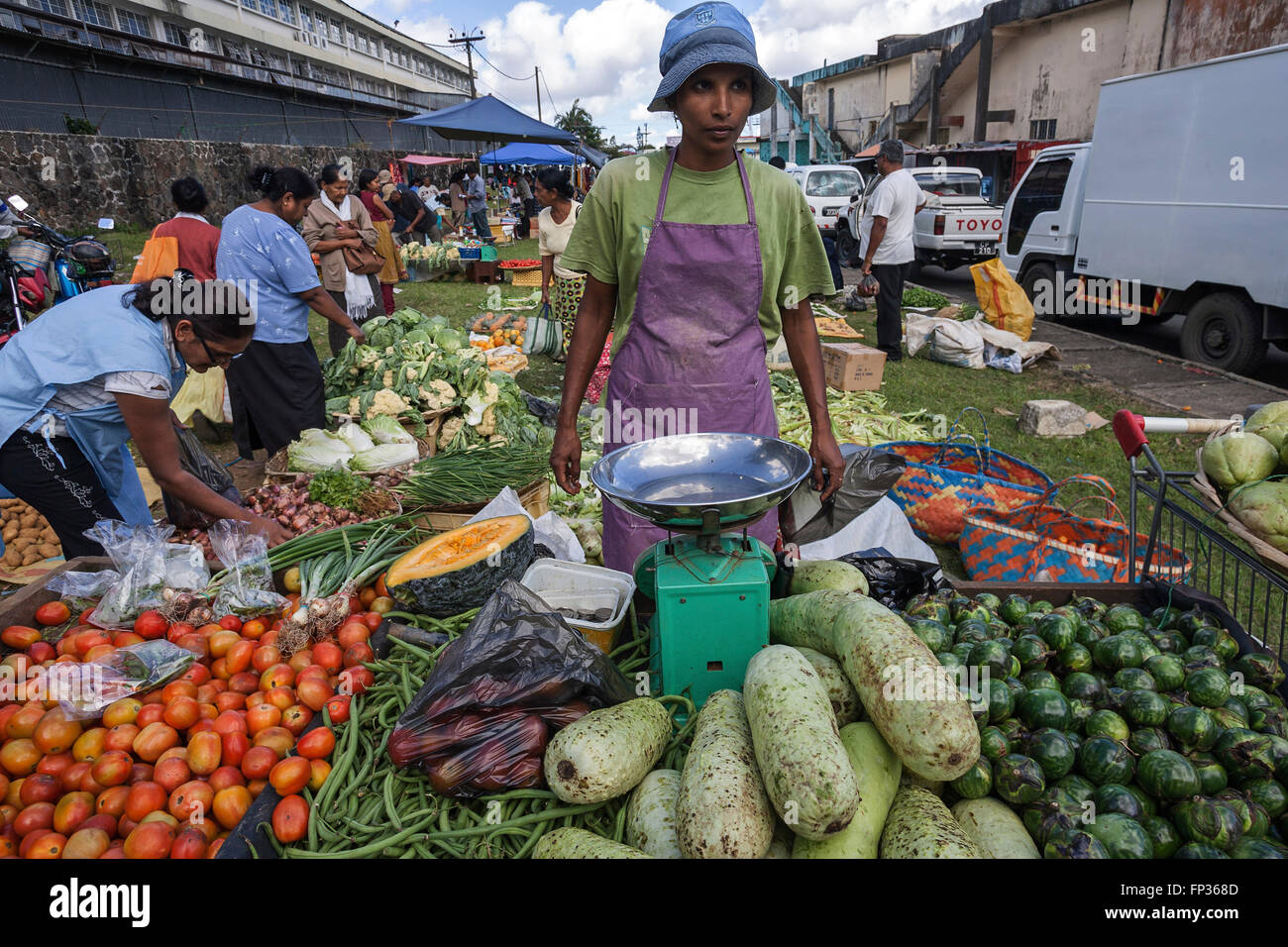 Market, local woman at a stall, vegetable market in Curepipe, Mauritius Stock Photo