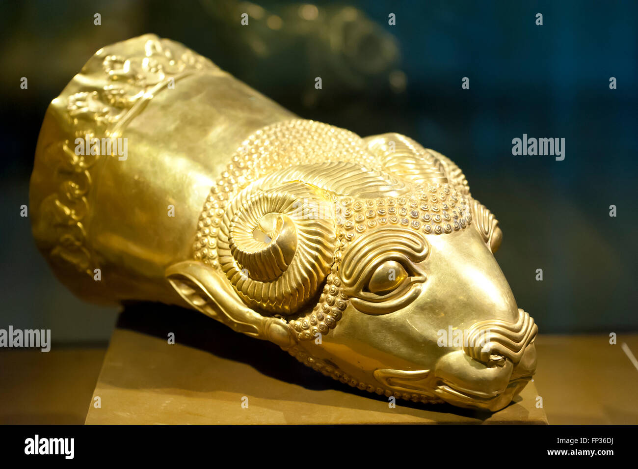 Gold rhyton, ram's head as a drinking vessel, pre-Islamic art, Persian Empire, Reza Abbasi Museum, Tehran, Iran Stock Photo