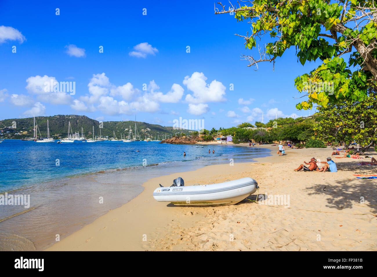Sandy beach and shoreline at Pigeon Point on English Harbour with