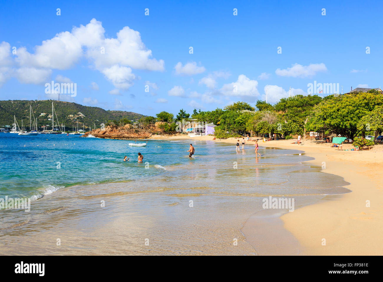 Sandy beach and shoreline at Pigeon Point on English Harbour with