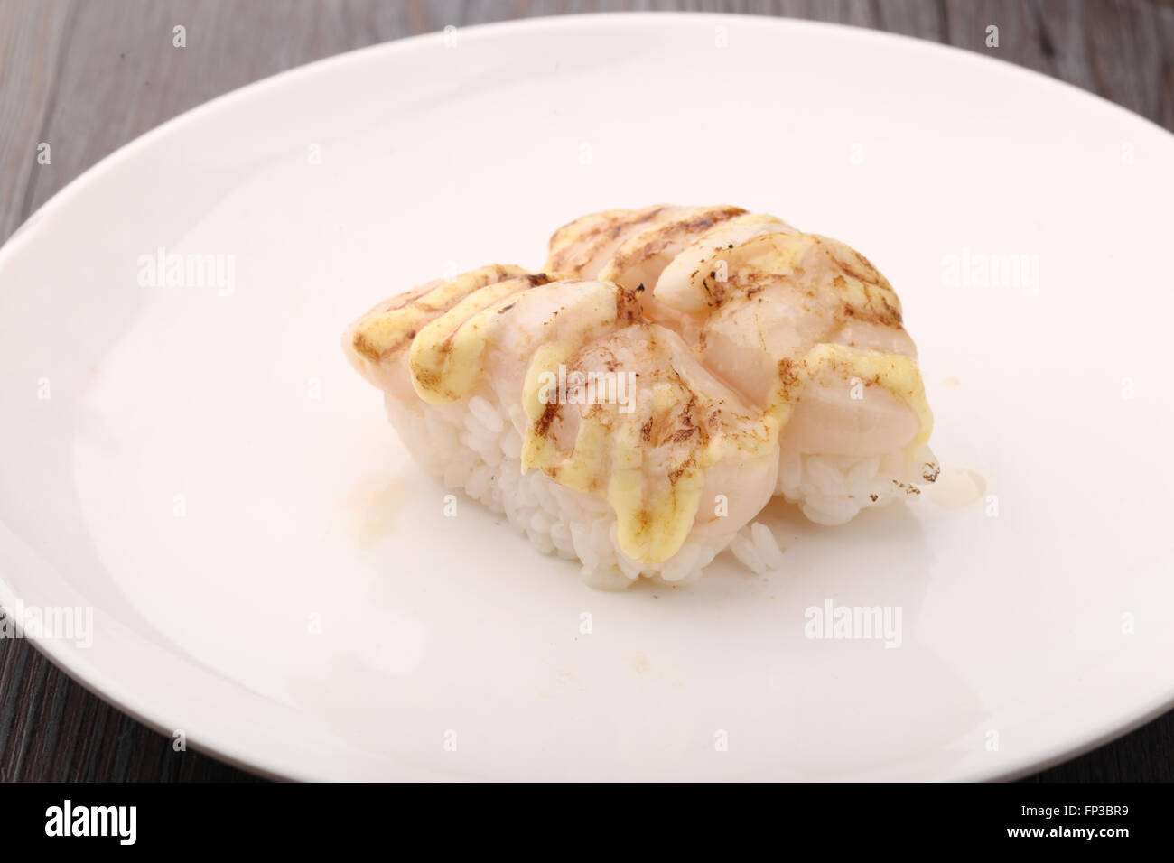 Flame grilled scallop sushi Stock Photo Alamy