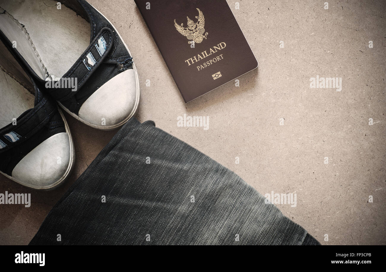 Outfit of traveler, Different objects on wooden background, Vintage style Stock Photo