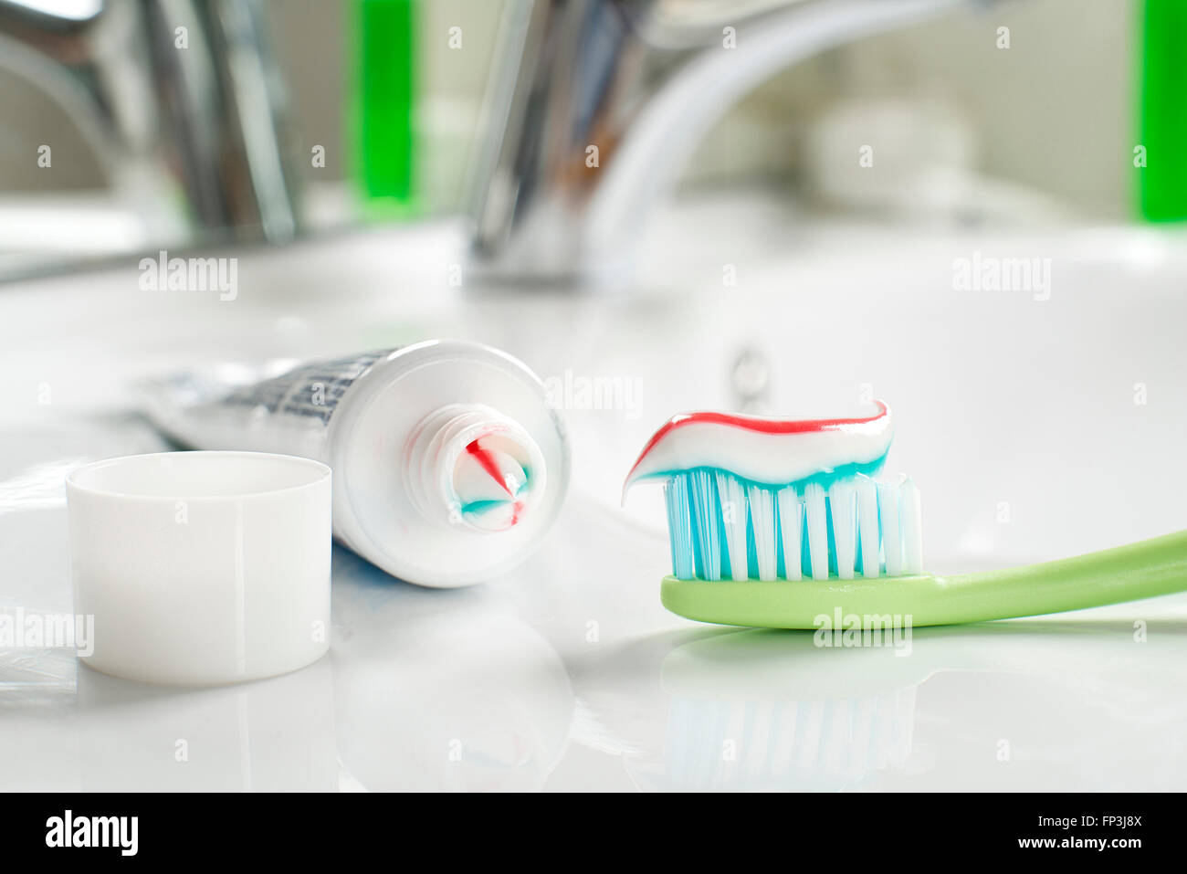 Toothbrush and toothpaste in the bathroom close up Stock Photo Alamy