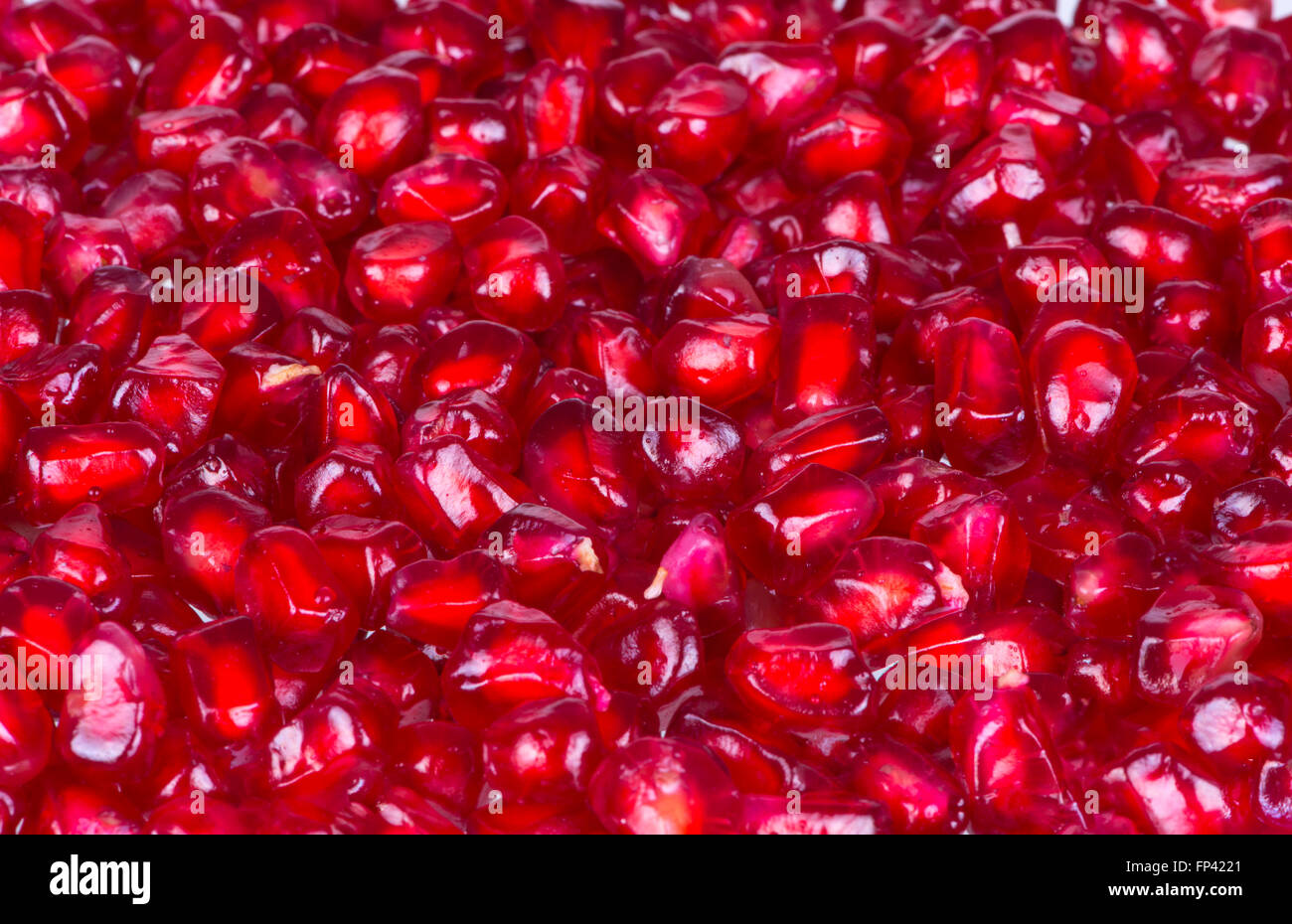 Closeup fresh pomegranate seeds for food background. Stock Photo