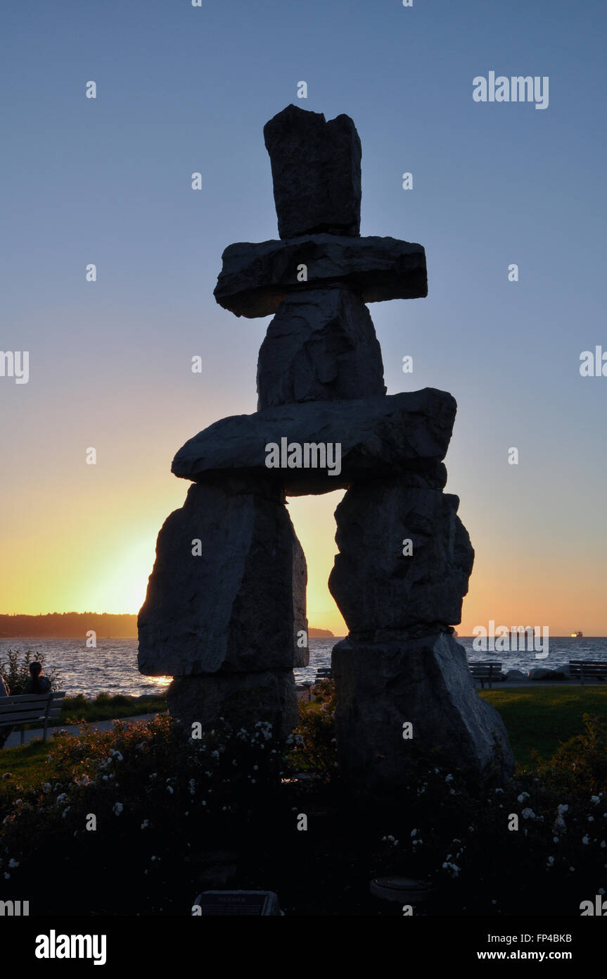 The Inukshuk, symbol of the First Nations at English Bay, Vancouver Stock Photo