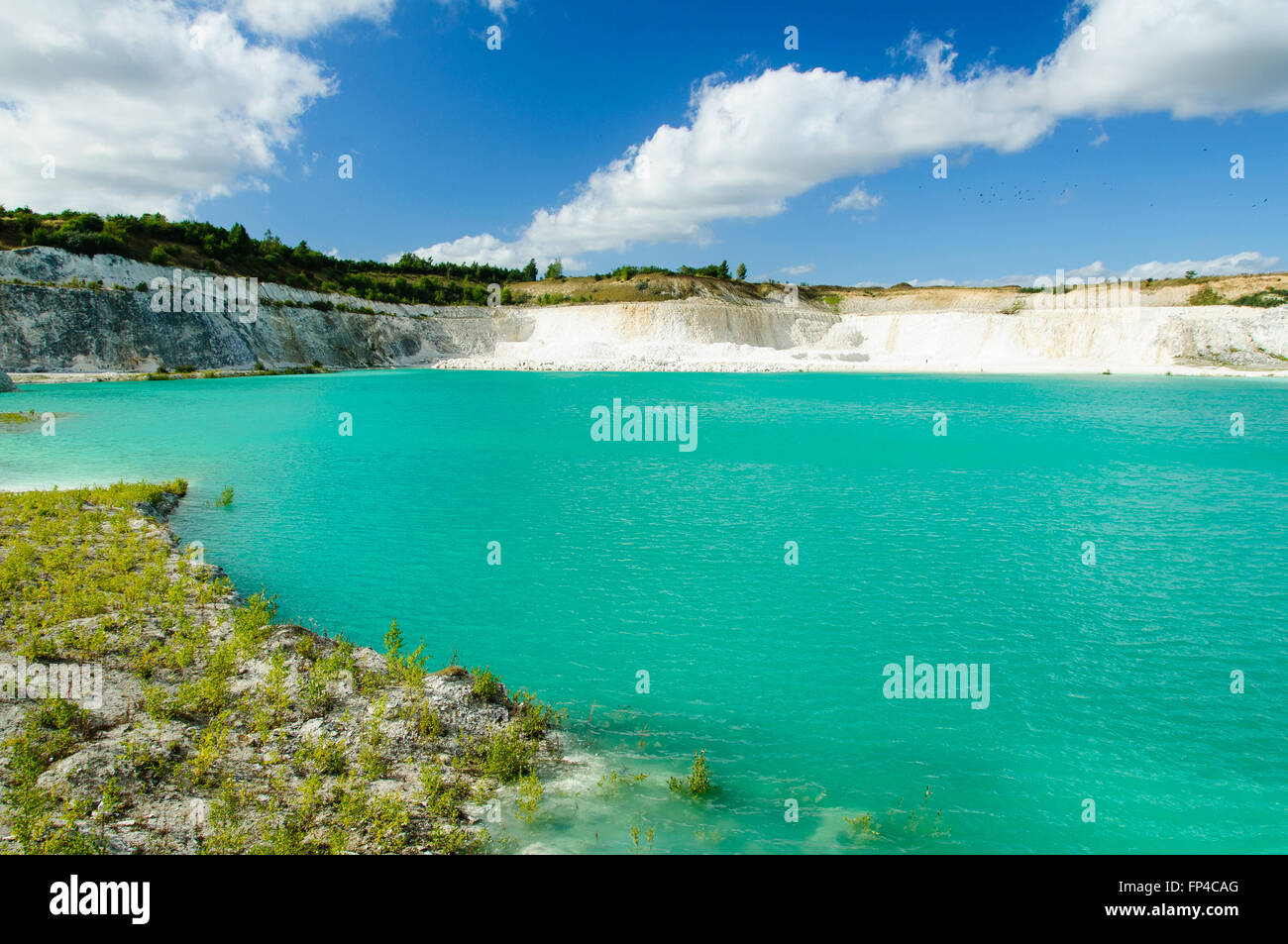 A turquoise lake with white cliff in Denmark Stock Photo