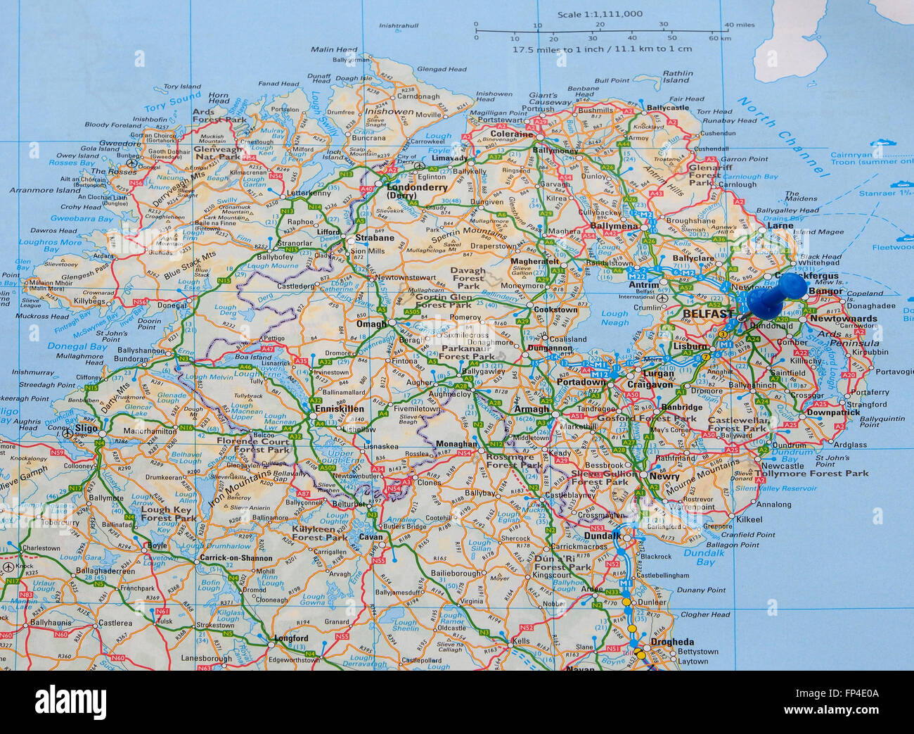Road map of Northern Ireland, with a map pin indicating Belfast, in County Antrim, the capital of Northern Ireland. Stock Photo