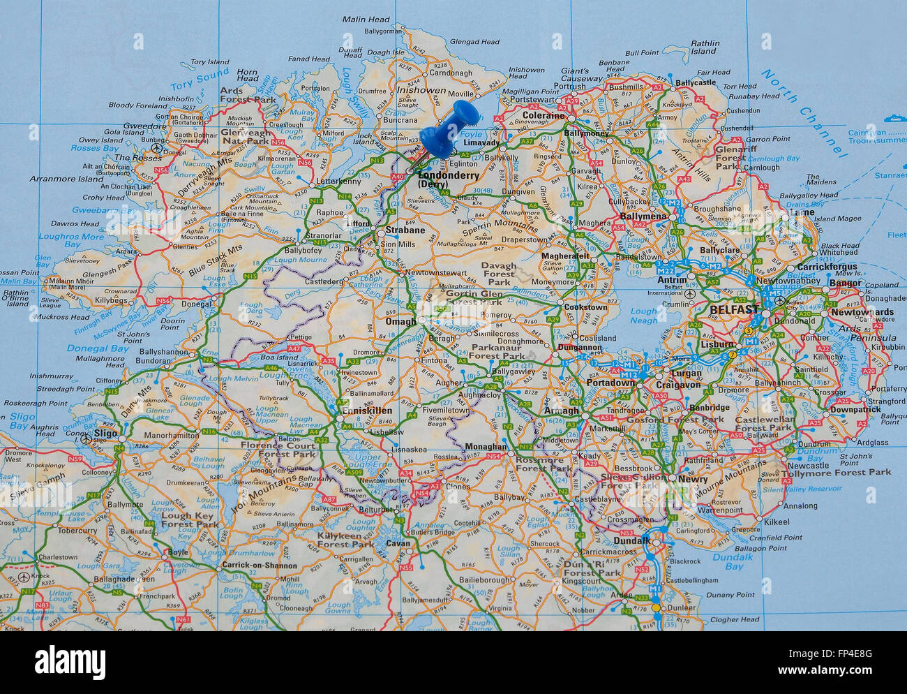 Road map of Northern Ireland, with a map pin indicating Londonderry (Derry). Stock Photo