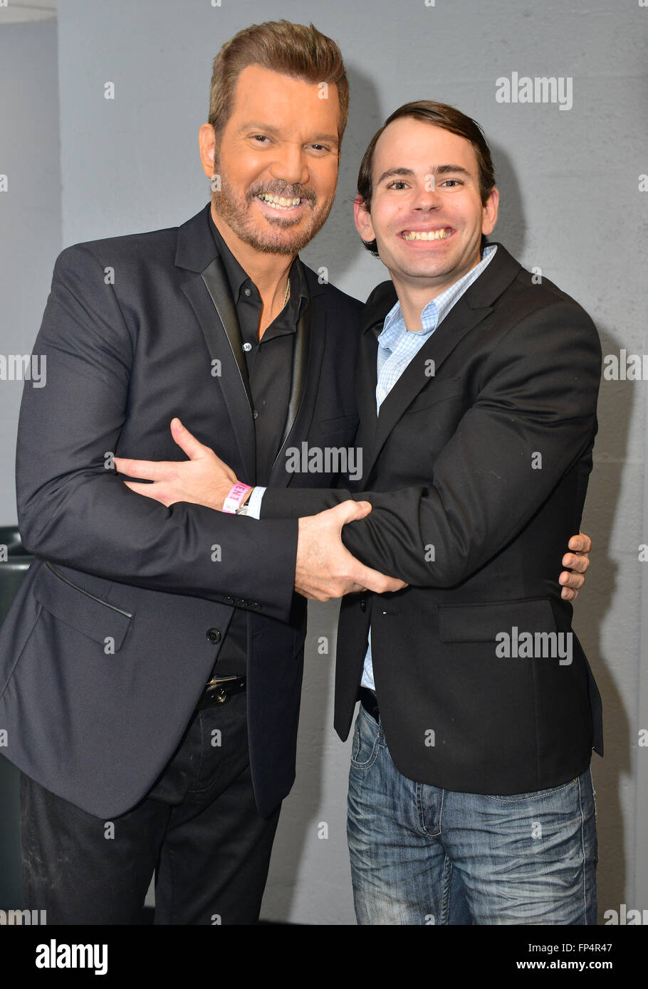Gilberto Santa Rosa and Willy Chirino backstage ahead of their concert at the James L. Knight Center  Featuring: Willy Chirino, Gianfranco Chirino Where: Miami, Florida, United States When: 14 Feb 2016 Stock Photo