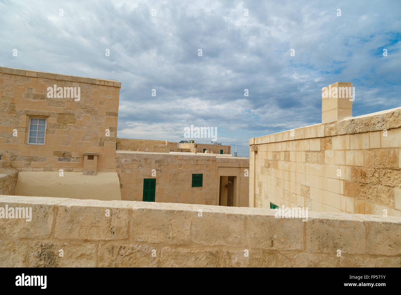 View of National War Museum in Valletta, Malta with high yellow stone