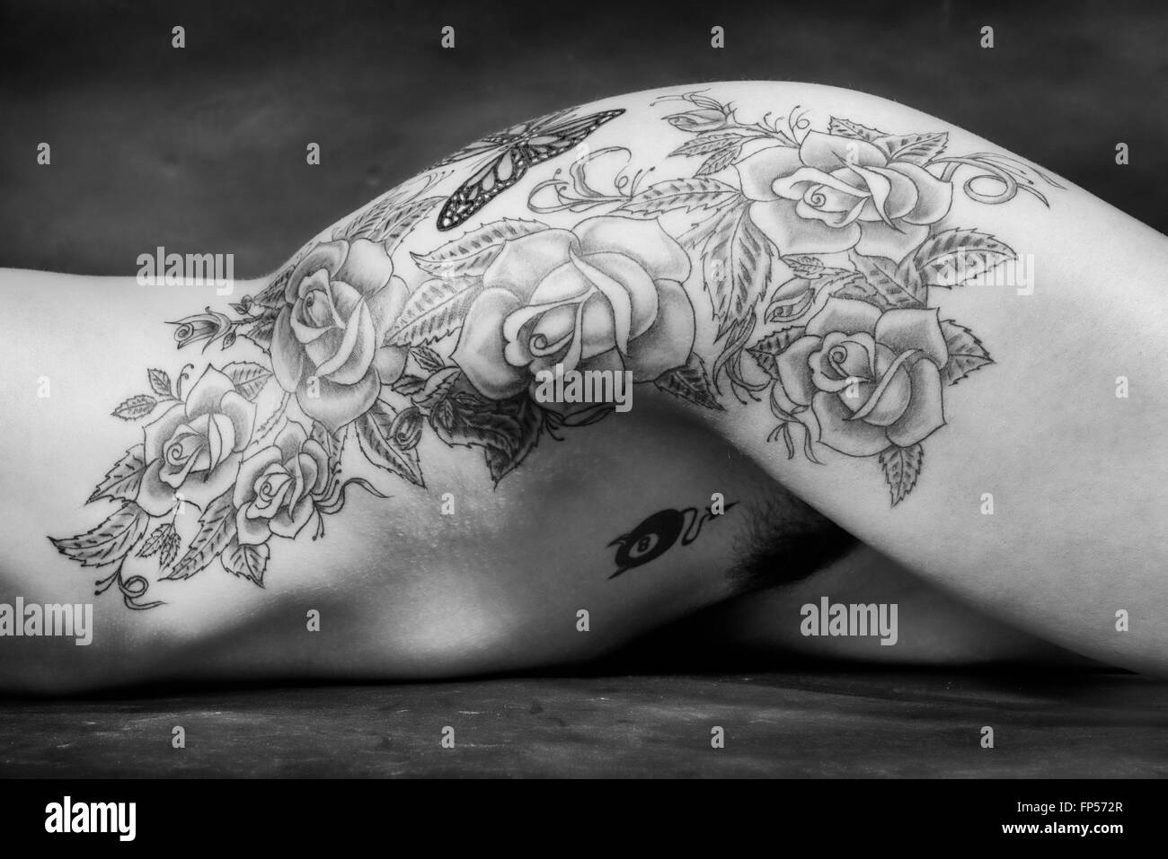 Black and white naked woman body scape with big tatoo over black background  Stock Photo - Alamy