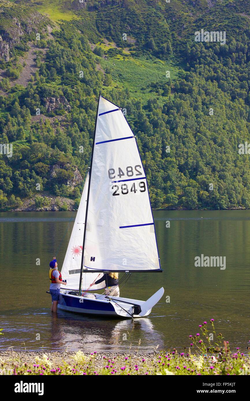 Lake District National Park. Couple dinghy sailing on lake. Aira Force