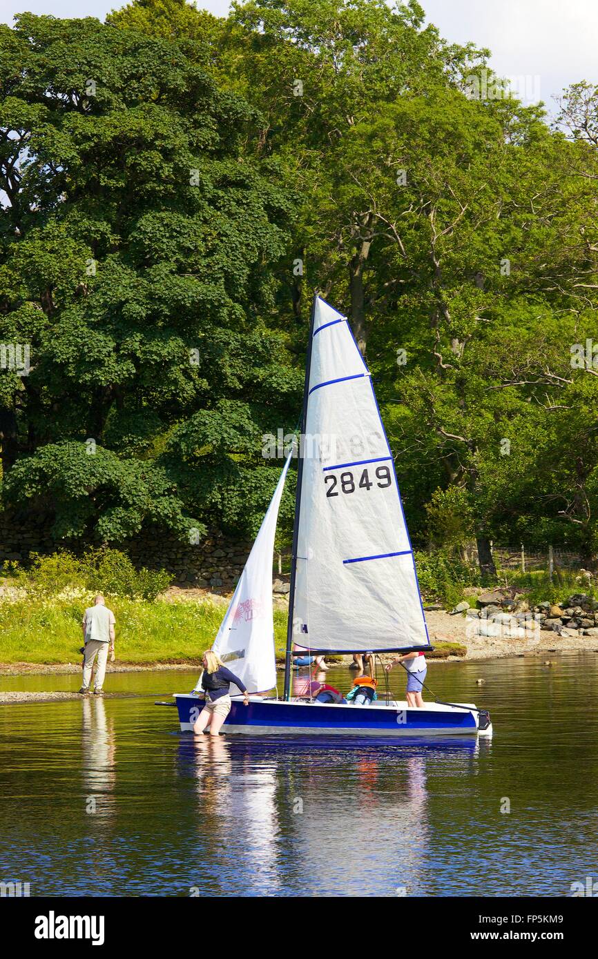 Lake District National Park. Family dinghy sailing on lake. Aira Force