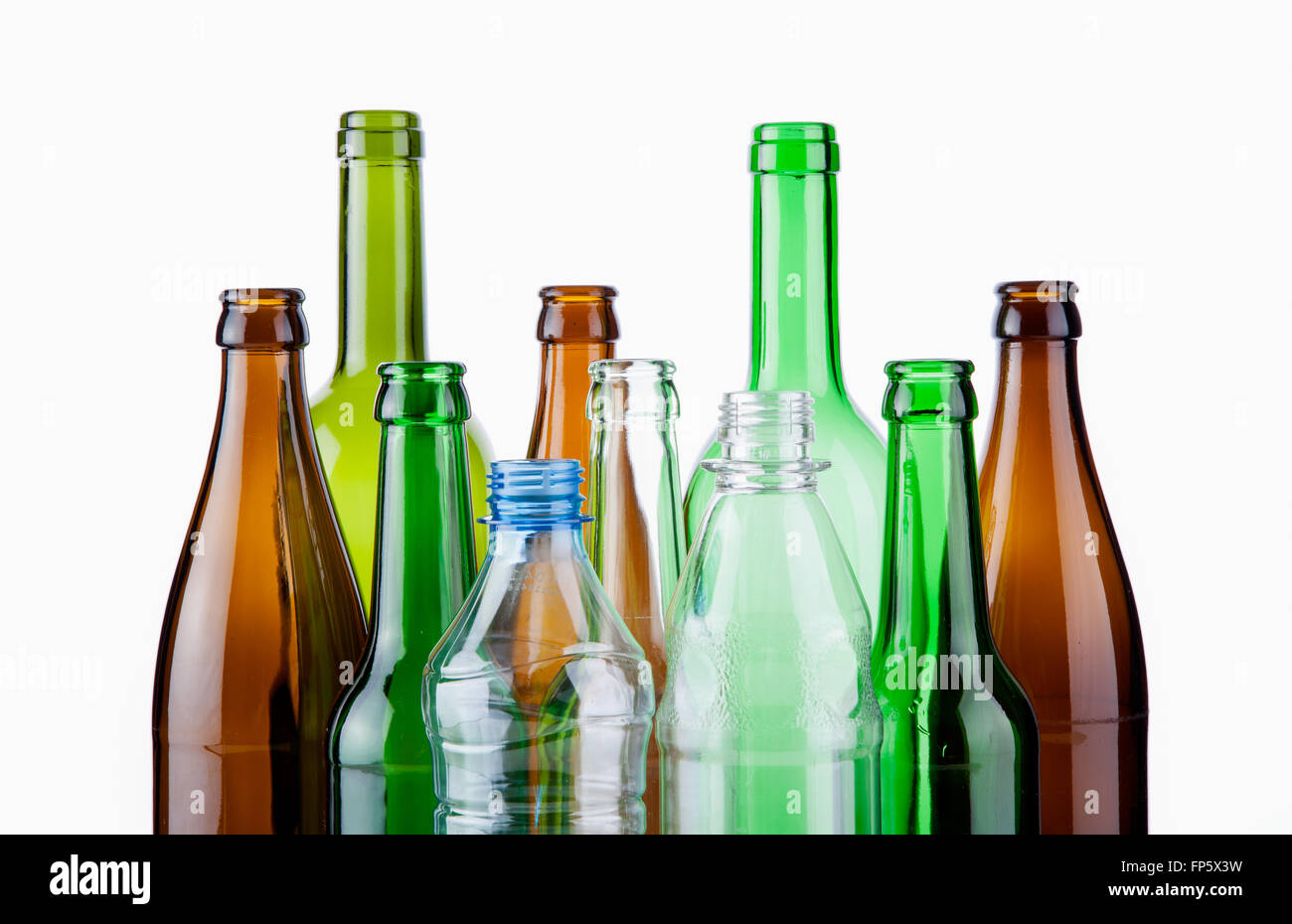 Empty bottles close-up isolated on white background Stock Photo - Alamy
