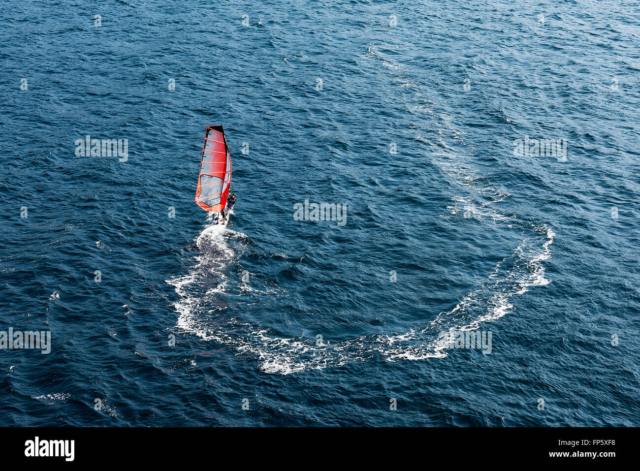 Man board sailing, Sorrento, Italy Stock Photo
