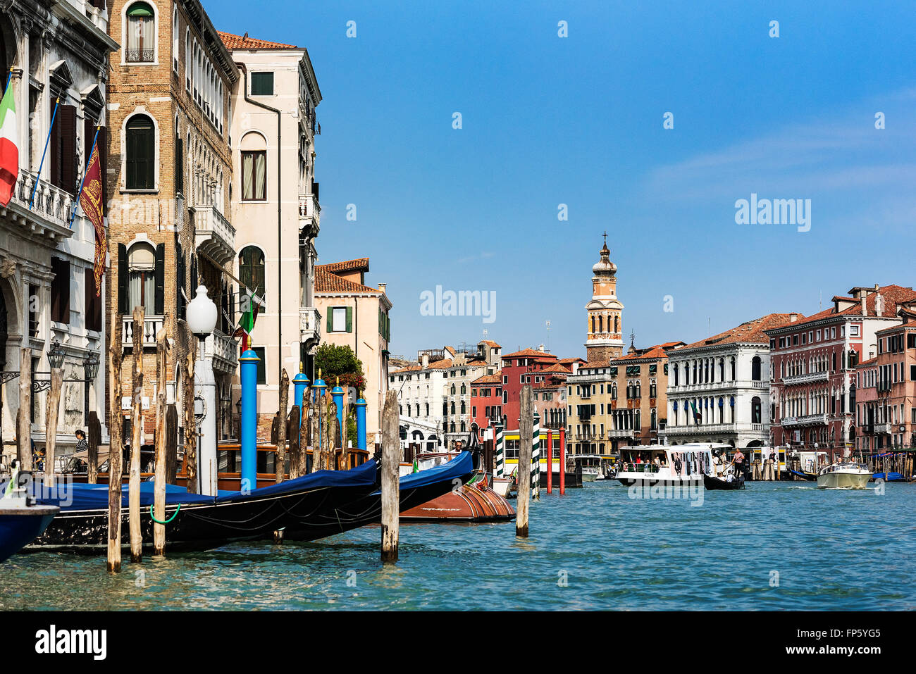 Gondoliers navigate the canals of Venice, Italy Stock Photo