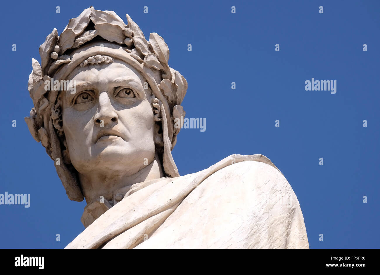 Dante Alighieri statue in Santa Croce square in Florence, Italy, on June 05, 2015 Stock Photo