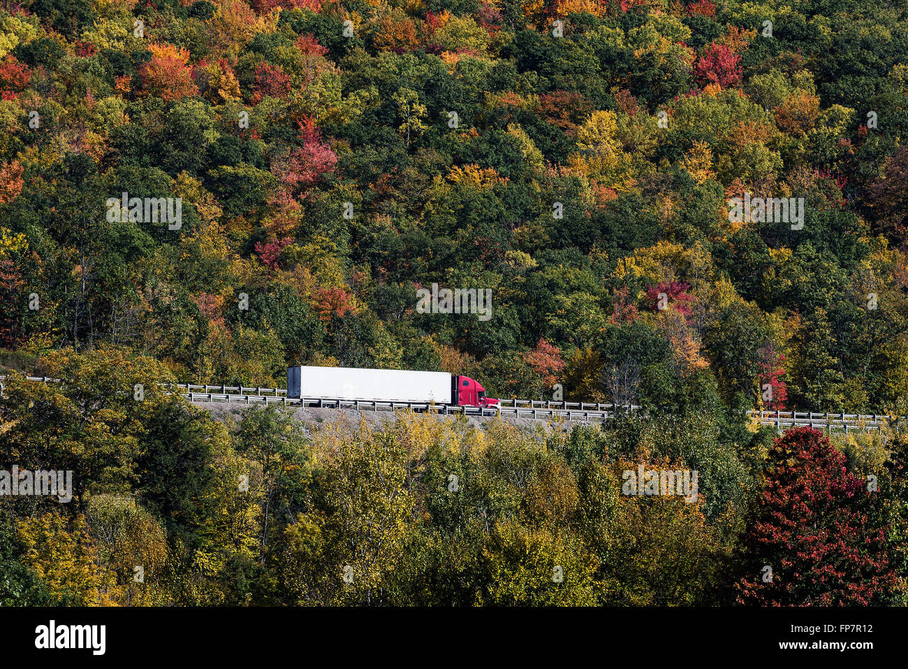Truck on the road enroute to delivery, Covington, Pennsylvania, USA Stock Photo