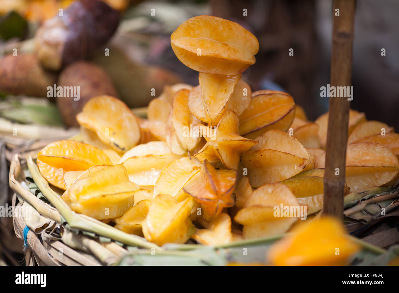 Close-Up Of Starfruits For Sale In Market Stock Photo