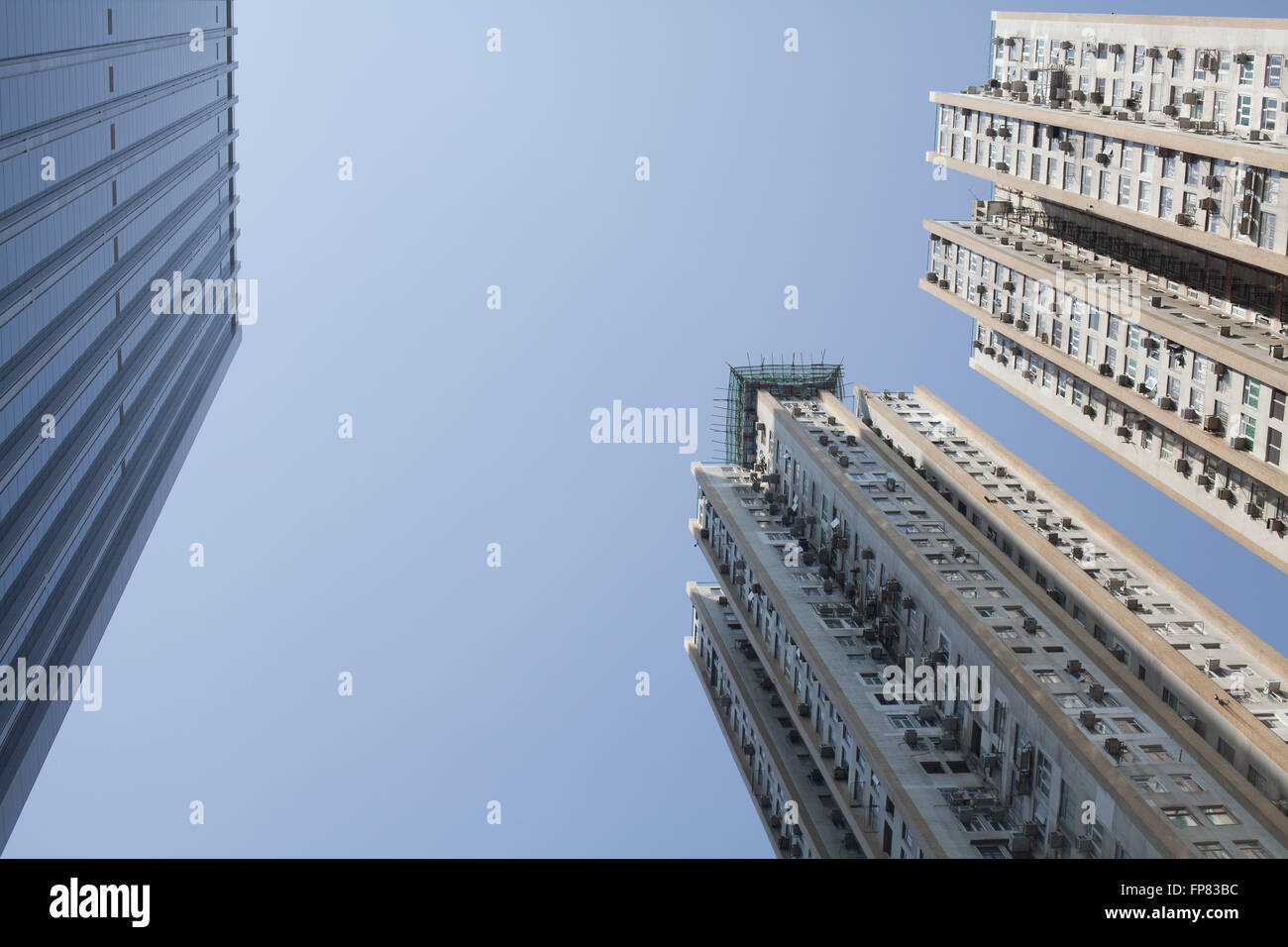Low Angle View Of Skyscrapers Against Clear Blue Sky Stock Photo
