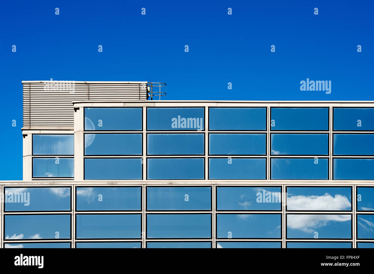 Milton Keynes office block glass windows abstract. Milton Keynes, Buckinghamshire, England Stock Photo