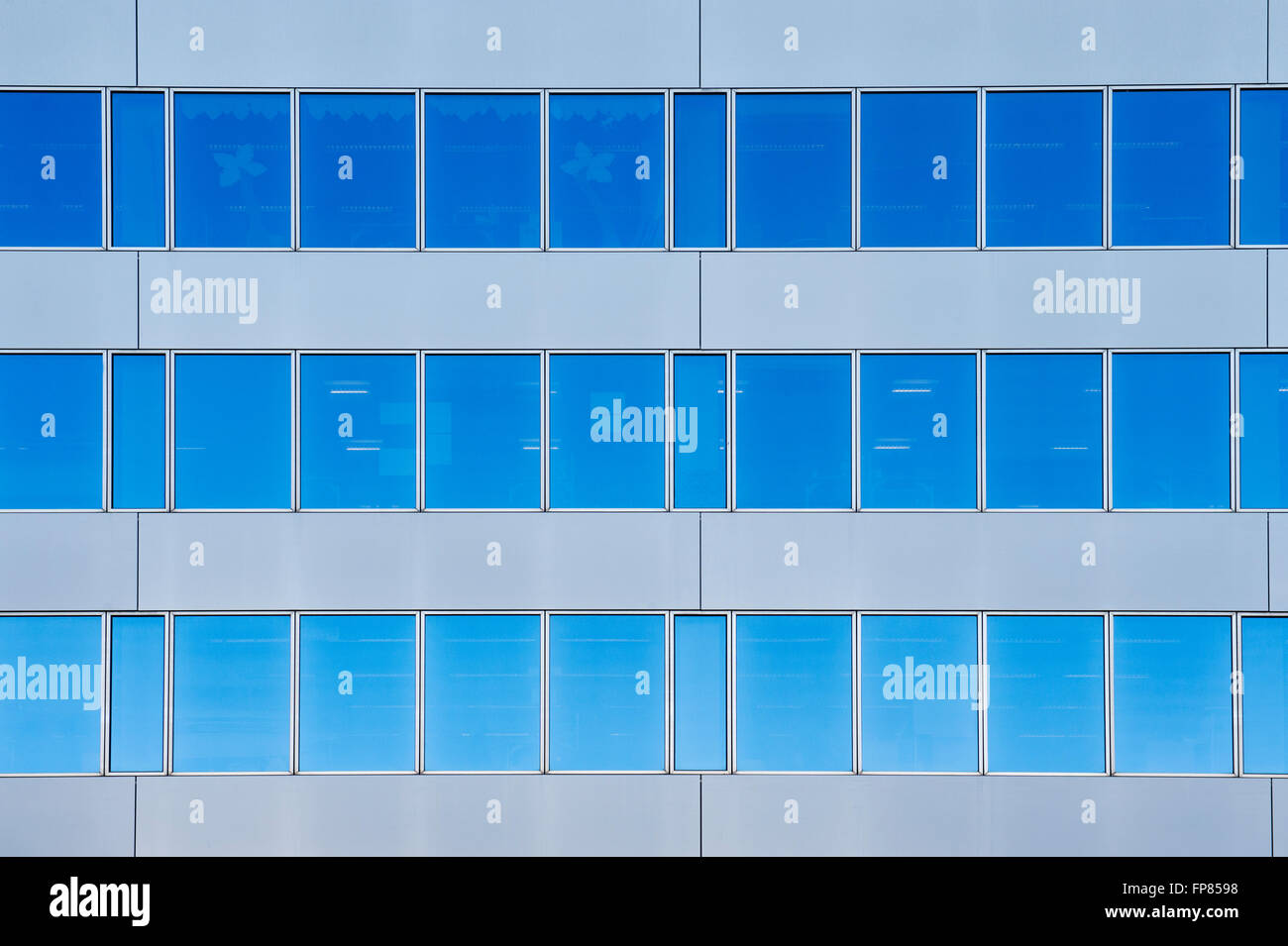 Milton Keynes office block glass windows abstract. Milton Keynes, Buckinghamshire, England Stock Photo