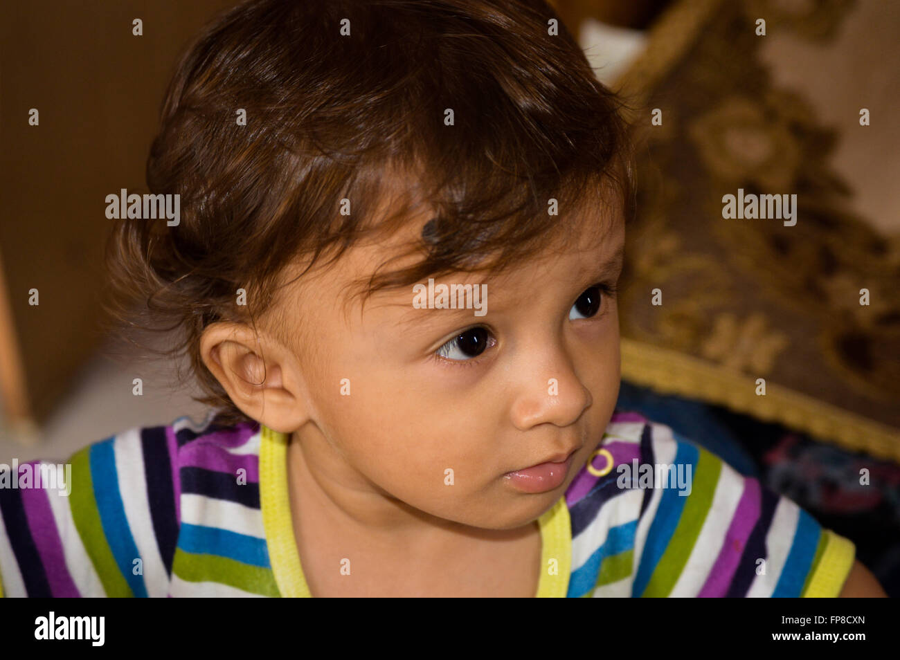 An Indian kid in playful mood Stock Photo