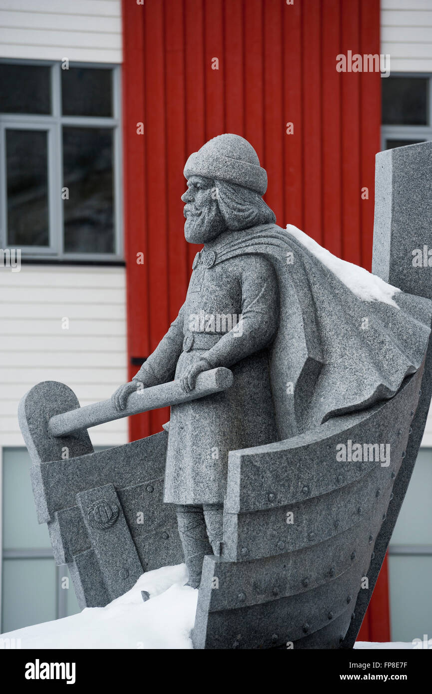 A statue of Viking chief Ottar overseeing the harbour. Finnsnes. Troms county. Norway. Stock Photo