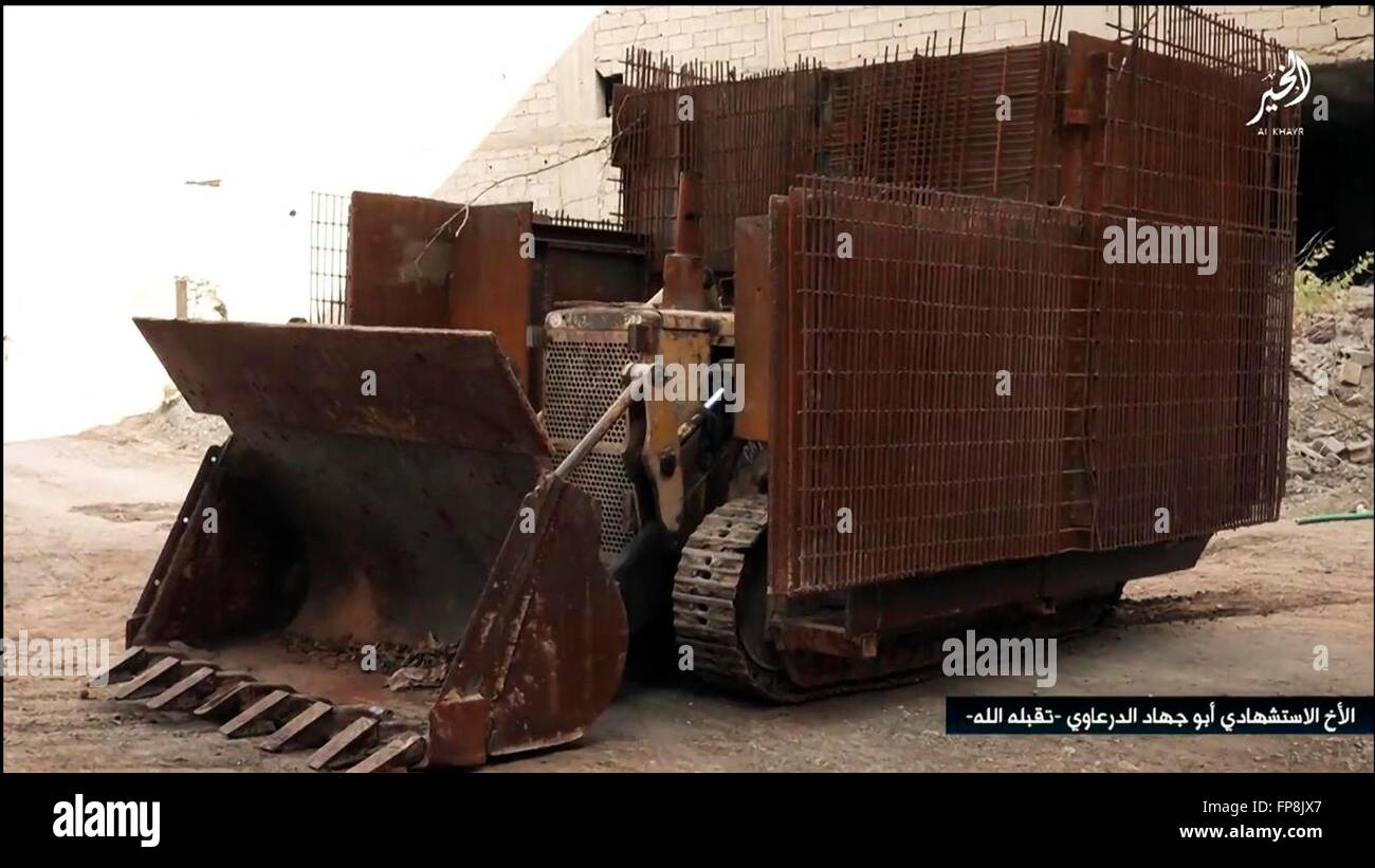 An ISIS propaganda video showing Islamic State homemade suicide vehicle covered in steel plates used as a mobile improvised explosive device during battles along the border of Iraq and Syria in an area described as Wilayah al-Khayr January 13, 2016 near Deir ez-Zor, Syria. Stock Photo