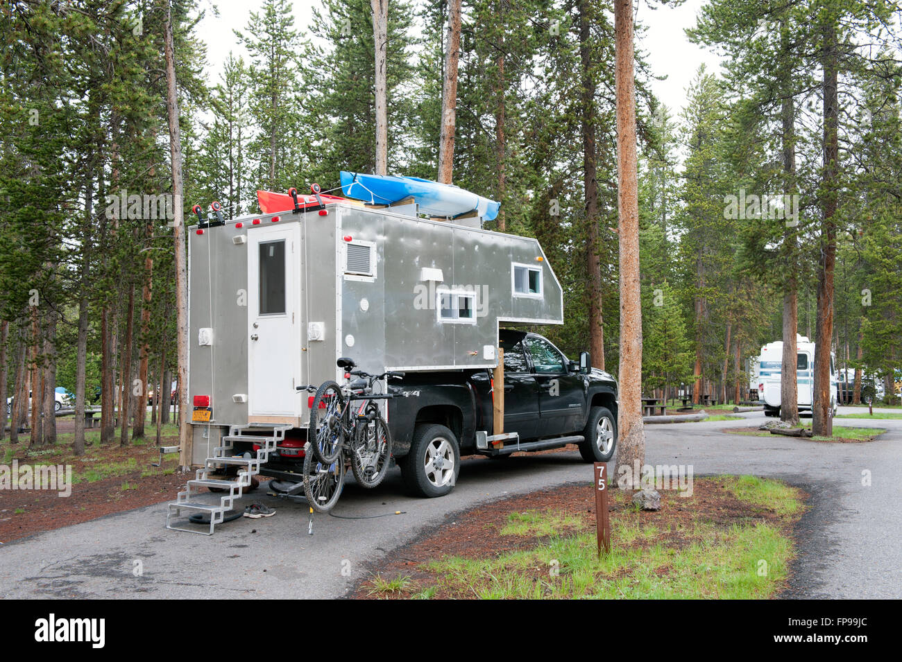YELLOWSTONE NATIONAL PARK, USA - JUNE 6, 2015: Self-made camper at a Yellowstone National Park campground. Stock Photo