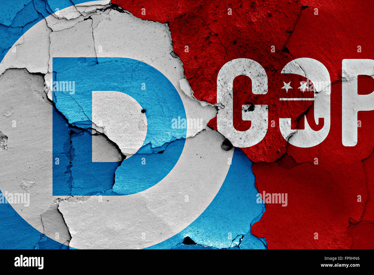 flag of Democrats and GOP painted on cracked wall Stock Photo