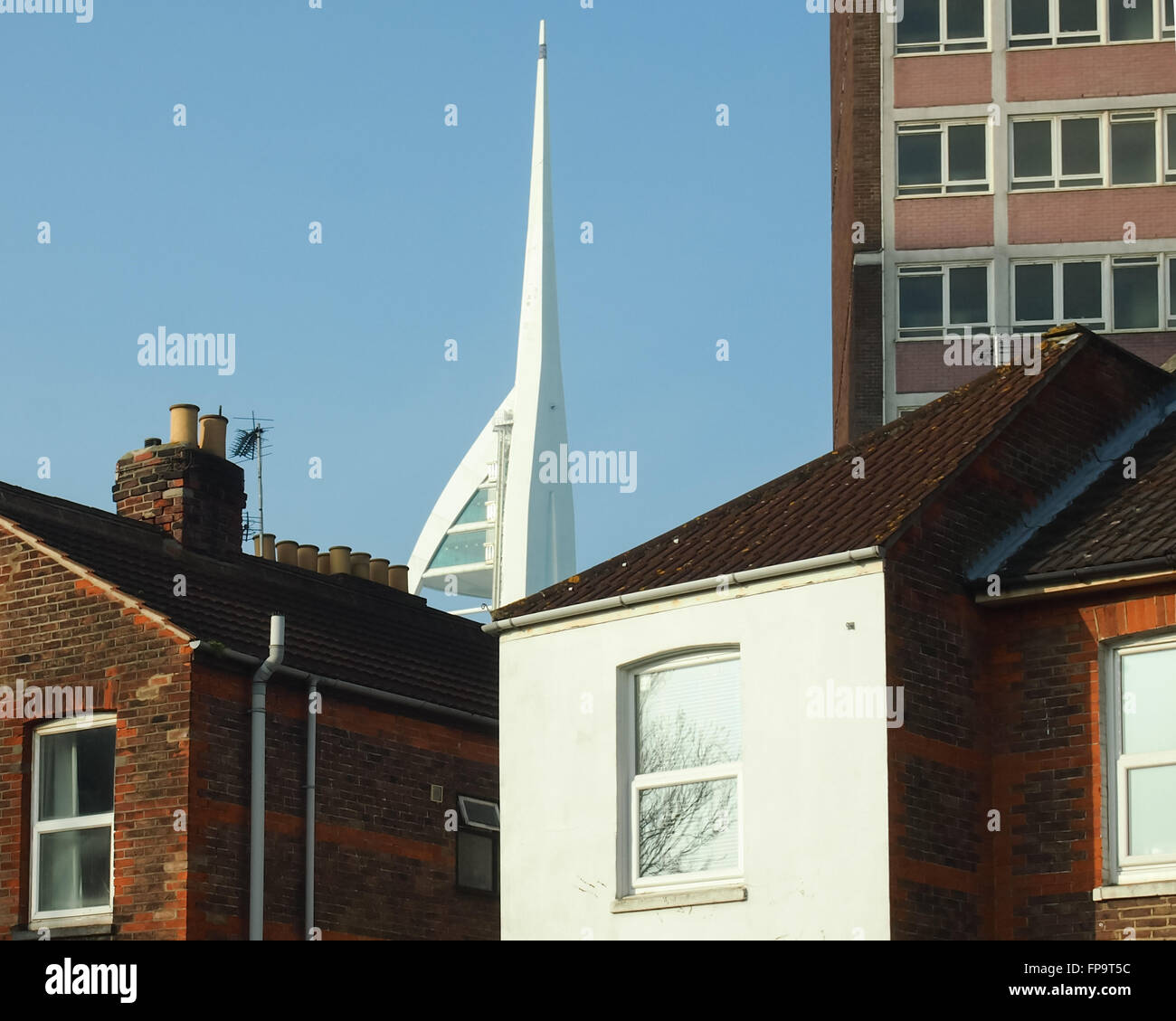 19th century housing is overlooked by the modern Spinnaker tower in Portsmouth, England Stock Photo