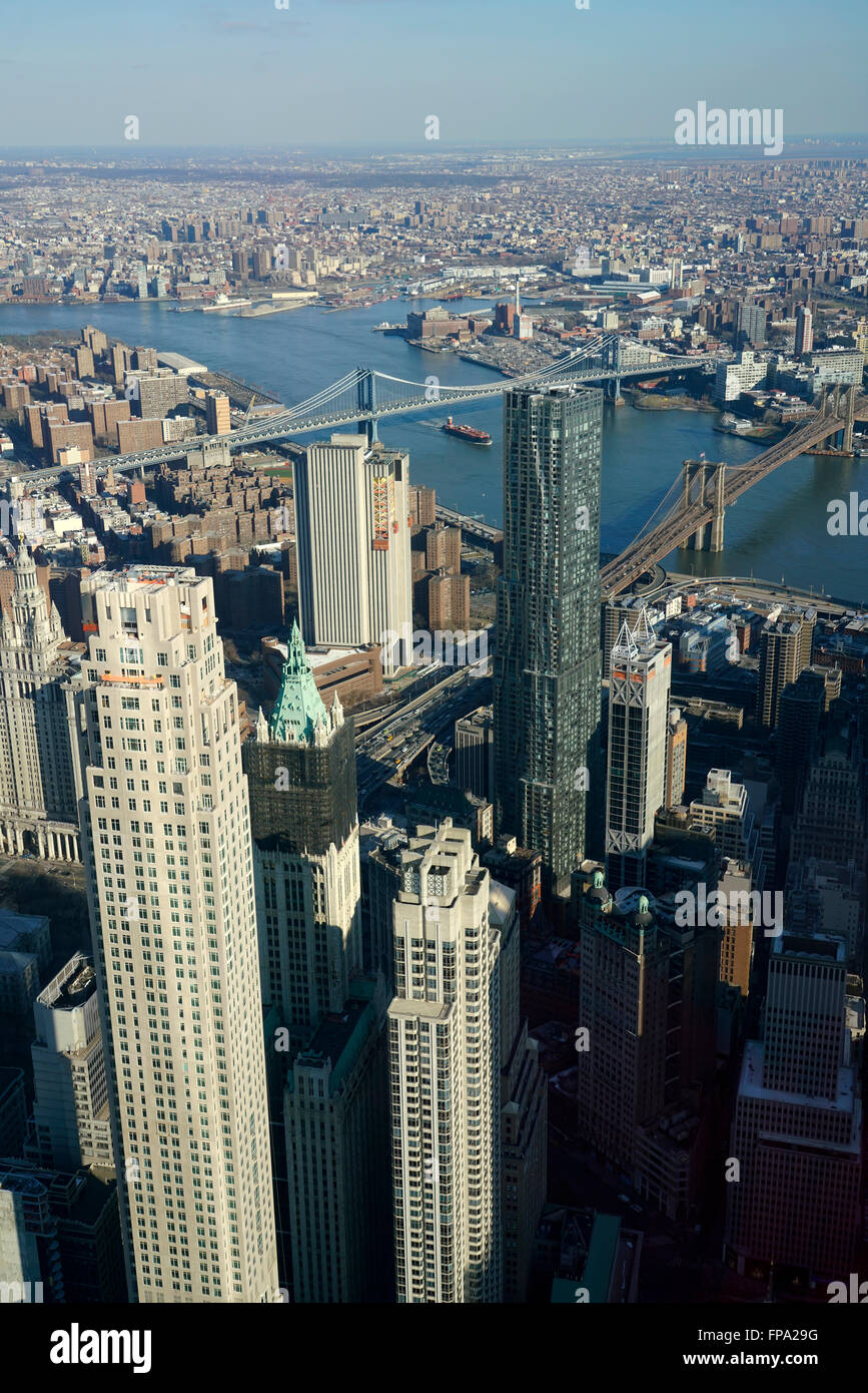 Aerial view of Lower Manhattan with Manhattan Bridge and Brooklyn Bridge over East River and borough of Brooklyn in background Stock Photo