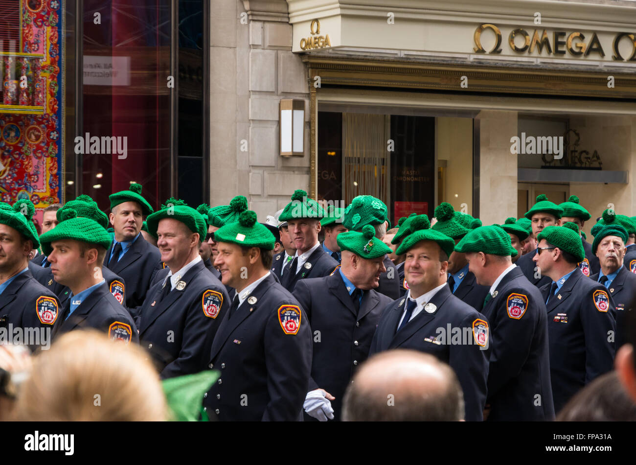 The Fire Department of New York wearing green berets and marching in the 2016 St Patrick's Day celebrations in New York City, USA Stock Photo