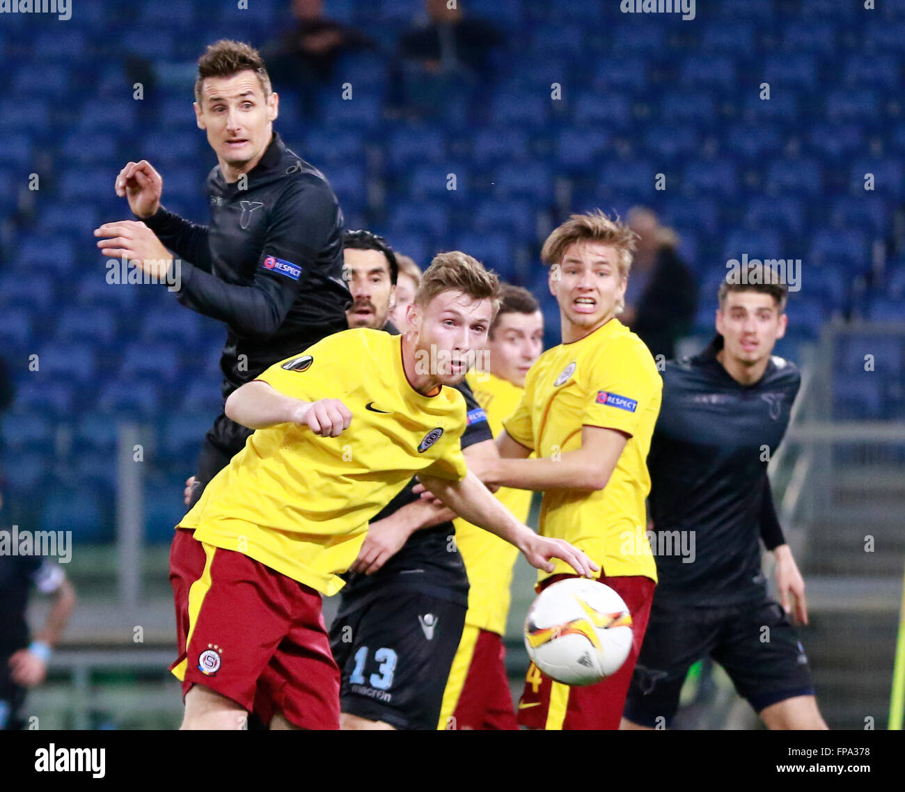 ROME, Italy. 17th Mar, 2016. Lazio's German forward Miroslav Klos(UP) heads the ball during the UEFA Europa League League roud of 16 second leg football match SS Lazio vs AC Sparta Praha on March 17, 2016 at the Olimpico Stadium. Sparta Praha won the match with the result of 3-0 © Carlo Hermann/Pacific Press/Alamy Live News Stock Photo