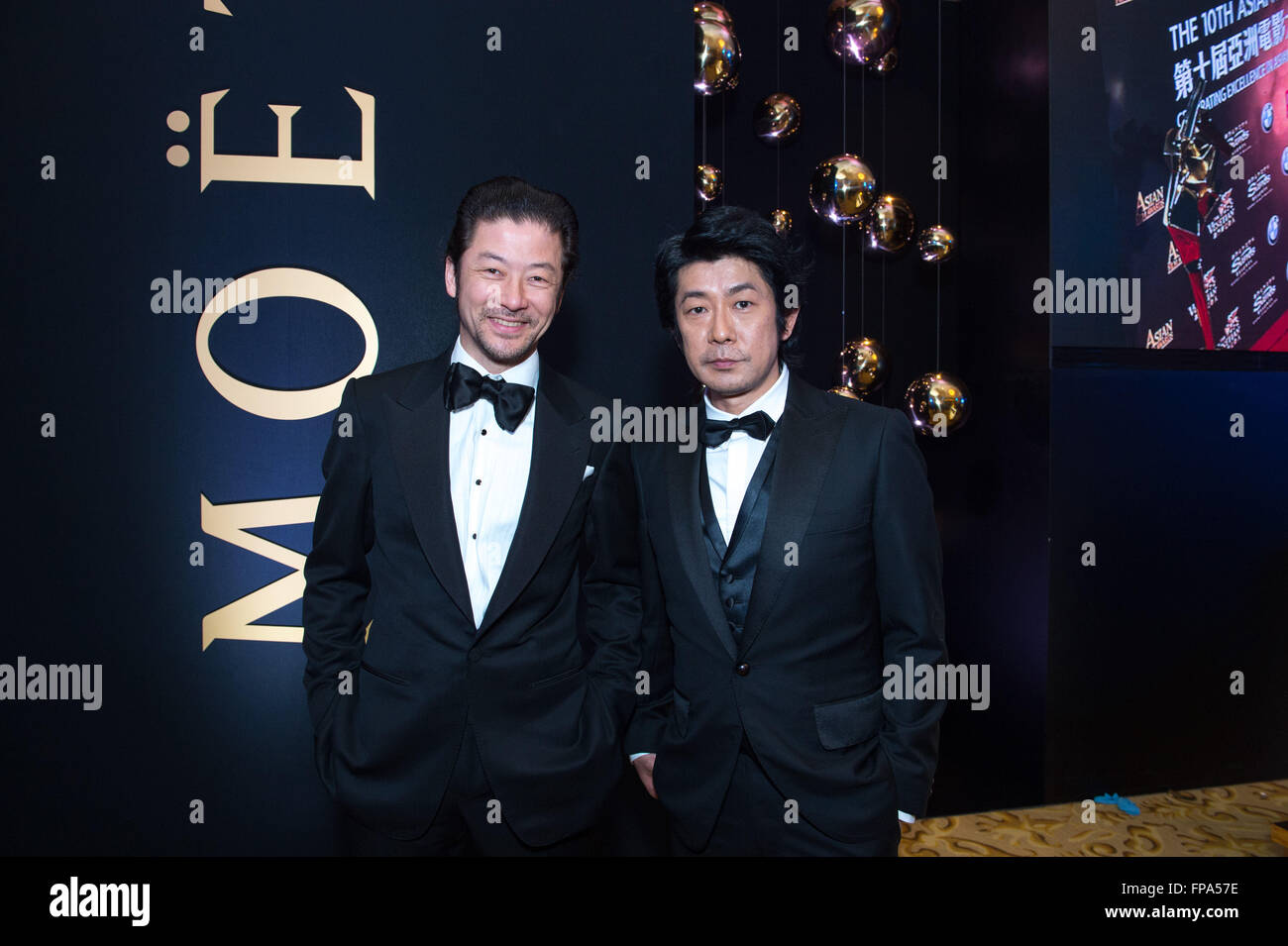 Hong Kong, Macau SAR, China. 17th Mar, 2016. L to R Japanese actor Masatoshi Nagase nominated for best actor and Japanese actor Tadanobu Asano who won best supporting actor prize for 'Journey to the Shore' in the Moet drinks room at the 10th Asian Film awards press conference Venetian Hotel Macau © Jayne Russell/ZUMA Wire/Alamy Live News Stock Photo