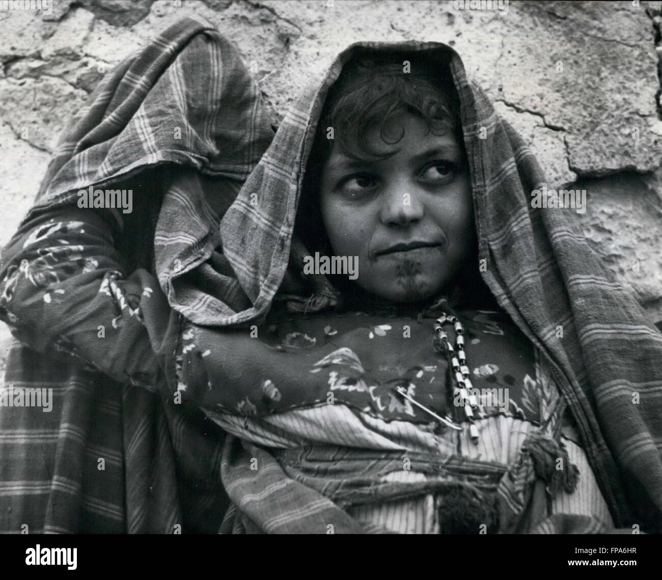 1982 - The Berbers as a whole are a good looking and healthy race. This pretty little girl lives amongst the ruins of the mountain town of Nalut. Her chin and tip of her noses have been tattooed to add to her beauty. © Keystone Pictures USA/ZUMAPRESS.com/Alamy Live News Stock Photo