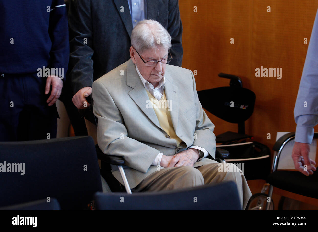 Detmold, Germany. 18th Mar, 2016. Defendant Reinhold Hanning arrives for the continuation of his trial in Detmold, Germany, 18 March 2016. Reinhold Hanning, a 94-year-old World War II SS guard is facing a charge of being an accessory to at least 170,000 murders at Auschwitz concentration camp. Prosecutors state that he was a member of the SS 'Totenkopf' (Death's Head) Division and that he was stationed at the Nazi regime's death camp between early 1943 and June 1944. Photo: Ina Fassbender/dpa/Alamy Live News Stock Photo