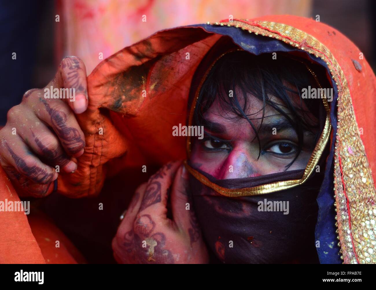 Mathura, Uttar Pradesh, India. 18th Mar, 2016. Mathura: An enouch take part in celebration of Lathmar holi festival of Nandgaon in Mathura on 18-03-2016. Lath mar Holi is a local celebration of the Hindu festival of Holi. It takes place days before the actual Holi in the neighbouring towns of Barsana and Nandgaon near Mathura in the state of Uttar Pradesh, where thousands of Hindus and tourists congregate, each year, The name means ''that Holi in which [people] hit with sticks' Credit:  Prabhat Kumar Verma/ZUMA Wire/Alamy Live News Stock Photo