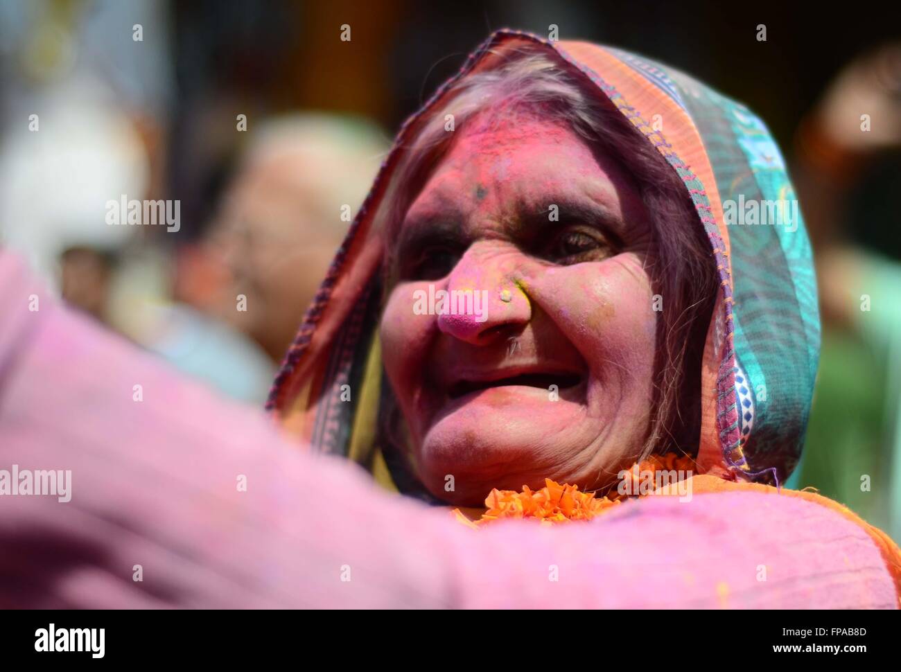 Mathura, Uttar Pradesh, India. 18th Mar, 2016. Mathura: An old Devotee dance during Lathmar holi festival celebration at Nandgaon in Mathura on 18-03-2016. Lath mar Holi is a local celebration of the Hindu festival of Holi. It takes place days before the actual Holi in the neighbouring towns of Barsana and Nandgaon near Mathura in the state of Uttar Pradesh, where thousands of Hindus and tourists congregate, each year, The name means ''that Holi in which [people] hit with sticks' Credit:  Prabhat Kumar Verma/ZUMA Wire/Alamy Live News Stock Photo
