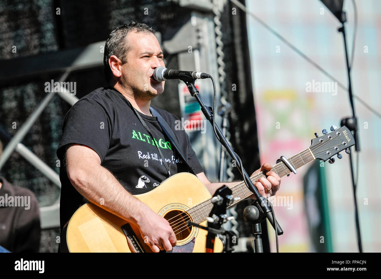 Belfast, Northern Ireland. 17 Mar 2016 - Manny Loughran from the Irish Traditional Folk band 'Altagore' plays guitar Credit:  Stephen Barnes/Alamy Live News Stock Photo